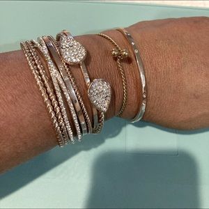 9 piece gorgeous Cz and gold tone bracelet set